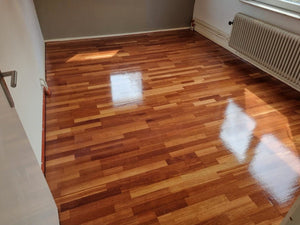 Houten vloer schuren en olien